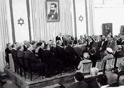 Ben-Gurion pronounces the Declaration of the Establishment of the State of Israel on May 14, 1948 in Tel Aviv.