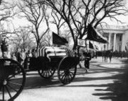 Kennedy's casket departs the White House.