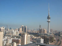 The skyline of Kuwait City. At 372 m (1,220 ft), the Liberation Tower (seen in background) is the world's thirteenth-tallest free-standing structure.
