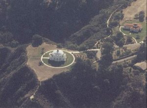 Mount Ecclesia landscape, with its 24 human-made structures, ornate rose gardens and luxuriant preserved vegetation — in the middle of one of the world's most expensive and intensive real estate development areas near downtown Oceanside in Southern California — is a paradigm of landscape equilibrium between the development of a built environment and the conservation of the natural environment, since the early 20th century and into the 21st century.