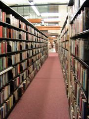 Libraries almost invariably contain long aisles with rows and rows of books.