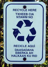 Recycling instructions in a Minneapolis park are given in four languages: English, Hmong, Spanish, and Somali