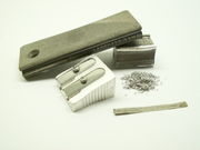 Products made of magnesium: firestarter and shavings, sharpener, magnesium band