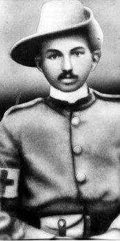 Gandhi in the uniform of a sergeant of the Indian Ambulance Corps. He served during the Boer War (1899).