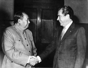 President Nixon greets Communist Party of China Chairman Mao (left) in a visit to China in 1972.