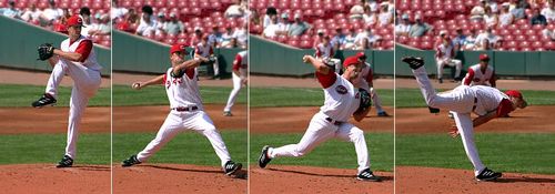 The baseball pitcher does work on the ball by transferring energy into it.