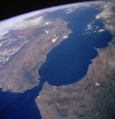 A satellite image taken from the side of the Straits of Gibraltar. At right, Africa; at left, Europe