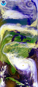 Satellite image of Hurricane Hugo with a polar low visible at the top of the image.