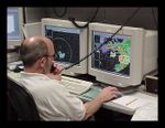 A meteorogist at work at the Storm Prediction Center in Norman, OK.