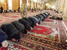 Muslims performing salah (prayer).