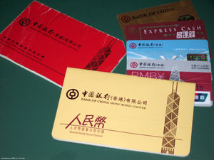 BOCHK passbooks and ATM cards. At the front is a BOCHK Renminbi card.