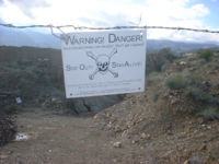 Stay out of old mines! Danger sign at an old Arizona mine.