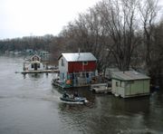 People live year-round in this community of boathouses on the Mississippi River in Winona, Minnesota.