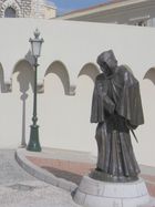 Memorial of François Grimaldi disguised as a monk with a sword under his frock