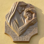 Memorial plaque dedicated to Mother Teresa at a building in Václavské náměstí square in Olomouc, Czech Republic.