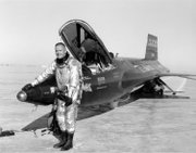 Neil Armstrong is seen here next to the X-15 ship #1 (56-6670) after a research flight.