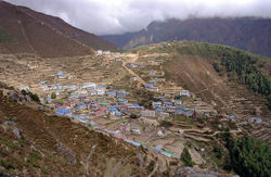 Namche Bazaar in the Khumbu region close to Mount Everest. The town is built on terraces in what resembles a giant Greek amphitheatre.