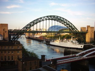 The Tyne Bridge, Newcastle's best known landmark. The earlier Swing Bridge is in the foreground.