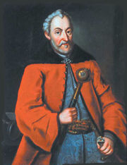 Kanclerzand GrandHetman Jan Zamoyski herbu Jelita, in crimson delia and blue silk żupan. Holds hetman's baton (buława hetmańska)