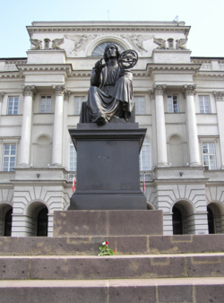 Statue of a seated Copernicus holding a armillary sphere, by Bertel Thorvaldsen, in front of the Polish Academy of Sciences, Warsaw.